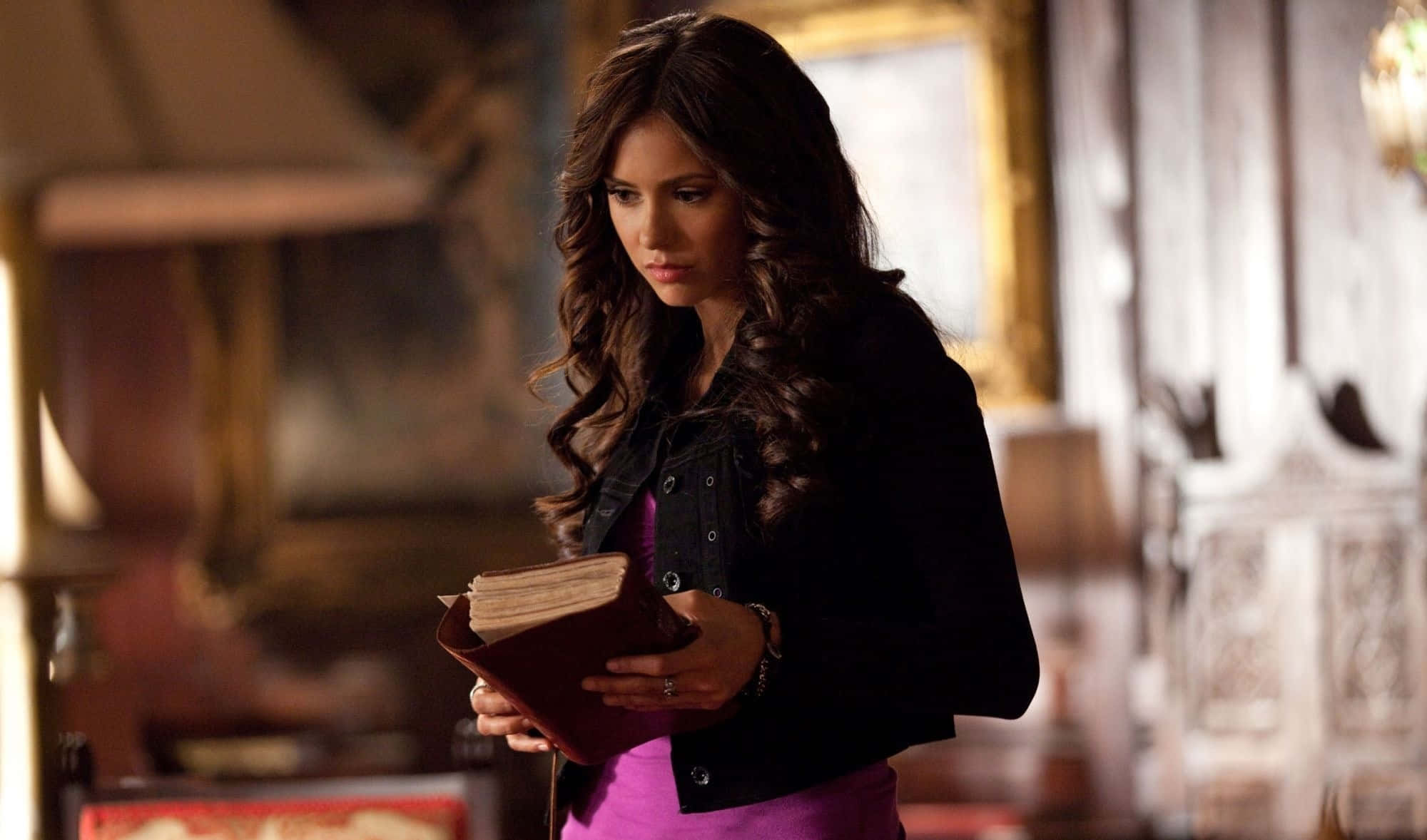 "enigmatic Katherine Pierce In A Haunting Stare" Wallpaper