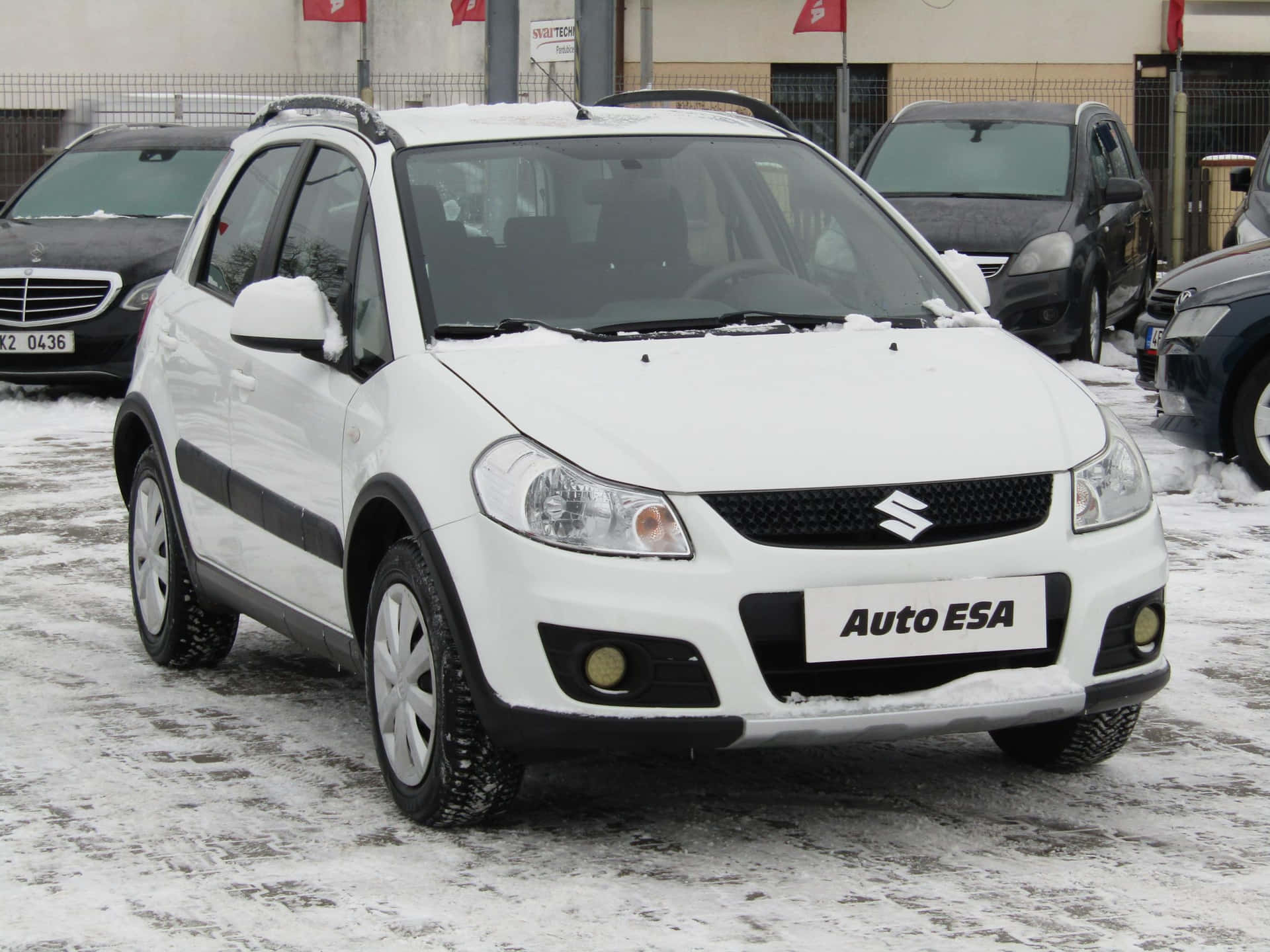 Enthralling Suzuki Sx4 In Bright Red Wallpaper