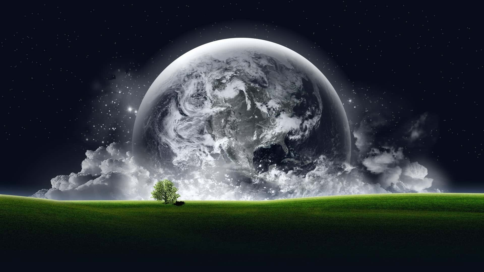A Green Tree And A Planet In The Sky Wallpaper