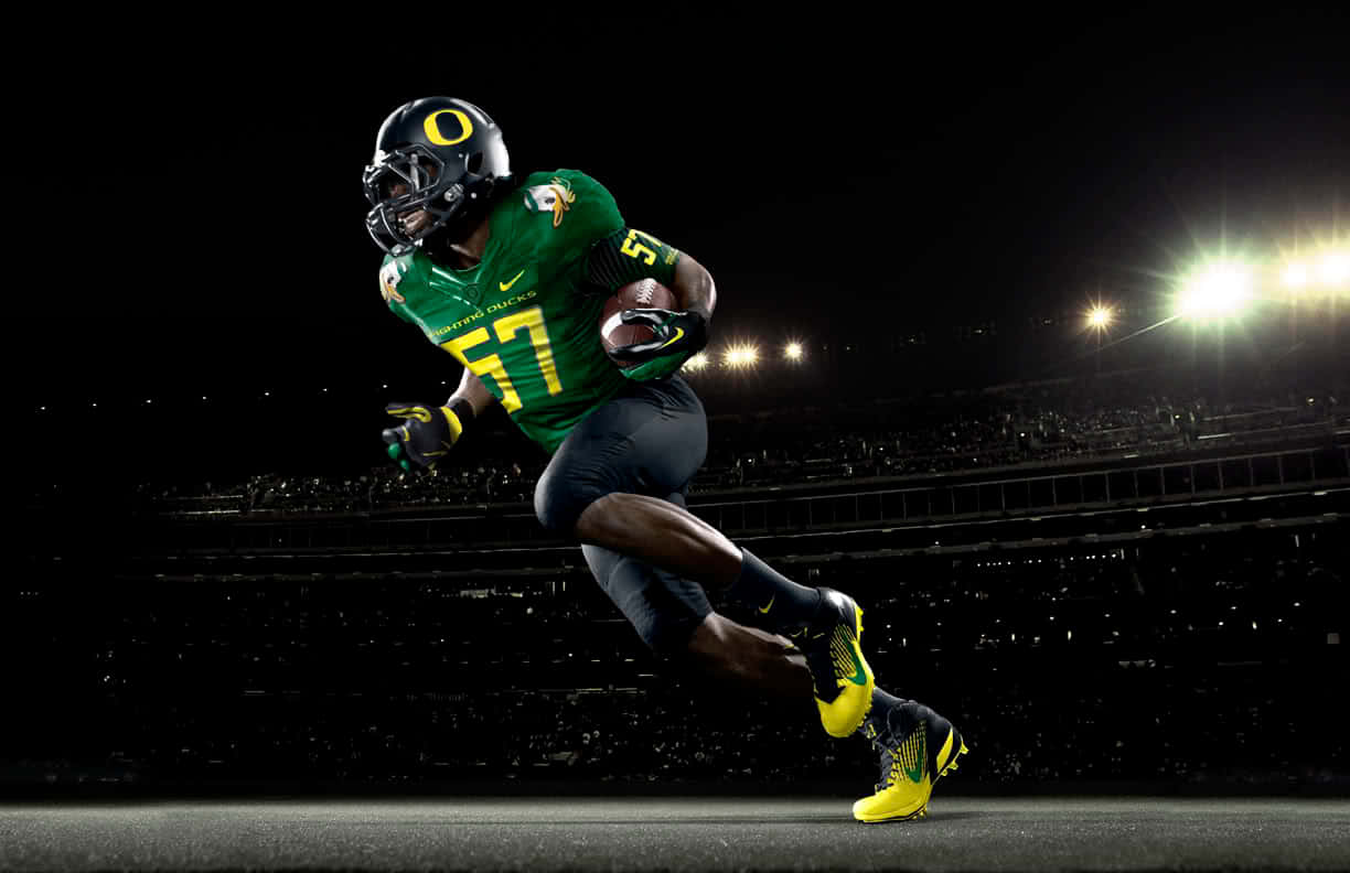 Équipe De Football Des Oregon Ducks En Action Fond d'écran