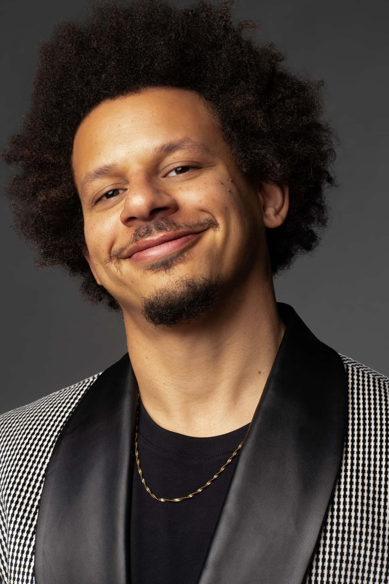 Download Eric Andre Portrait Smiling Wallpaper | Wallpapers.com