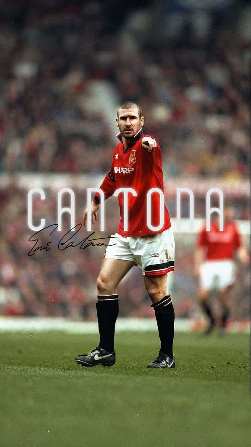 Eric Cantona, A Football Icon In Action Wallpaper
