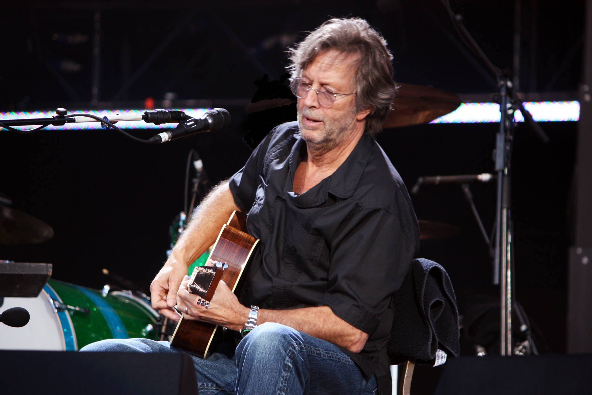 Eric Clapton Guitarist In Black Polo Wallpaper