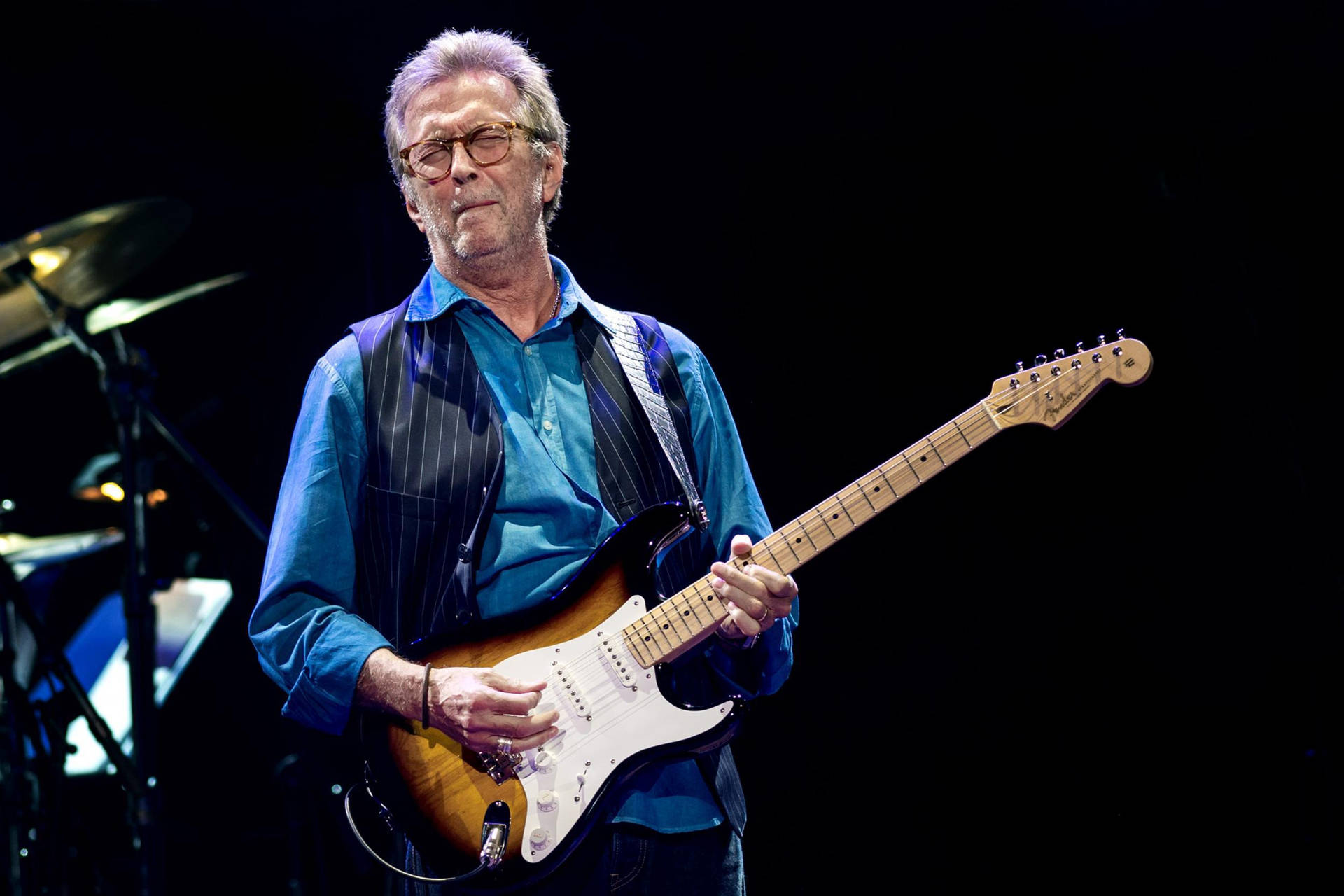 Eric Clapton signature blå polo skjorte og jeans tapet Wallpaper