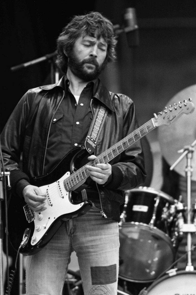 Eric Clapton Rocking His Electric Guitar Wallpaper