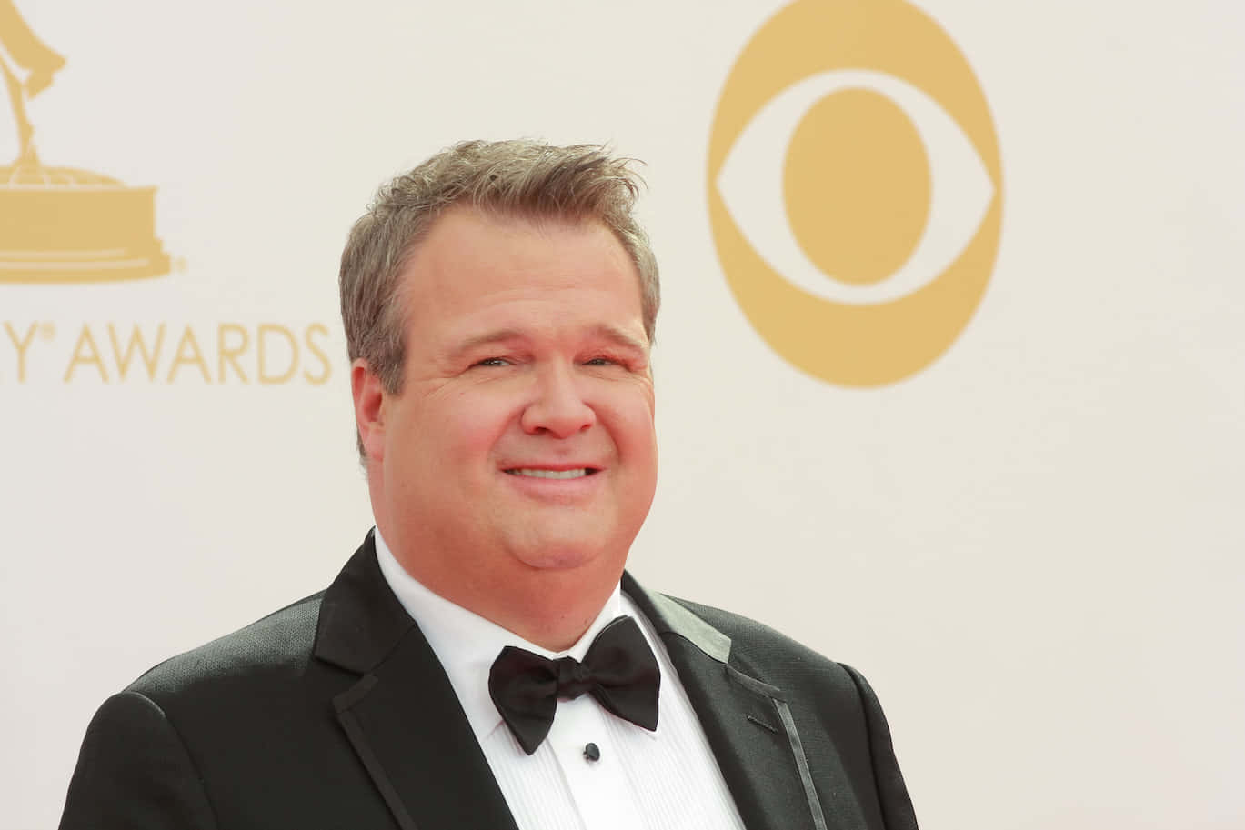 Ericstonestreet Is An American Actor Who Is Best Known For His Role As Cameron Tucker In The Tv Show 