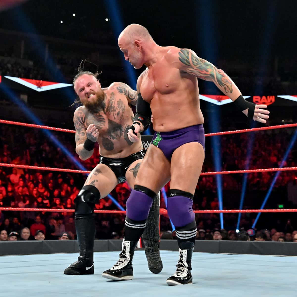WWE Superstars Eric Young and Aleister Black Square Off in Raw Wallpaper