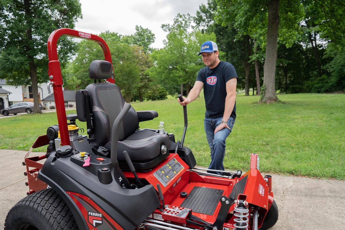 Erick Jones With A Red Commercial Lawn Mower Wallpaper
