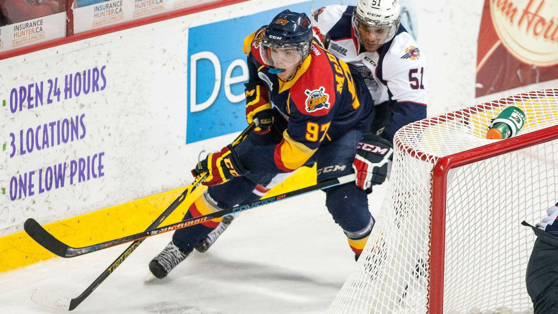 Caption: Erie Otters Star Player - Connor McDavid in Action Wallpaper