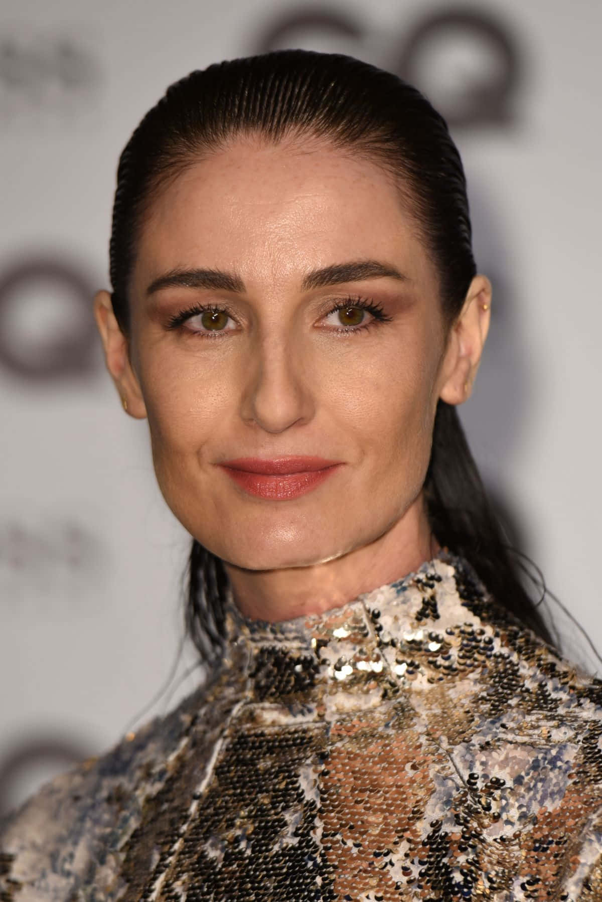 Erin O'connor Op Een Avondgala Evenement Achtergrond