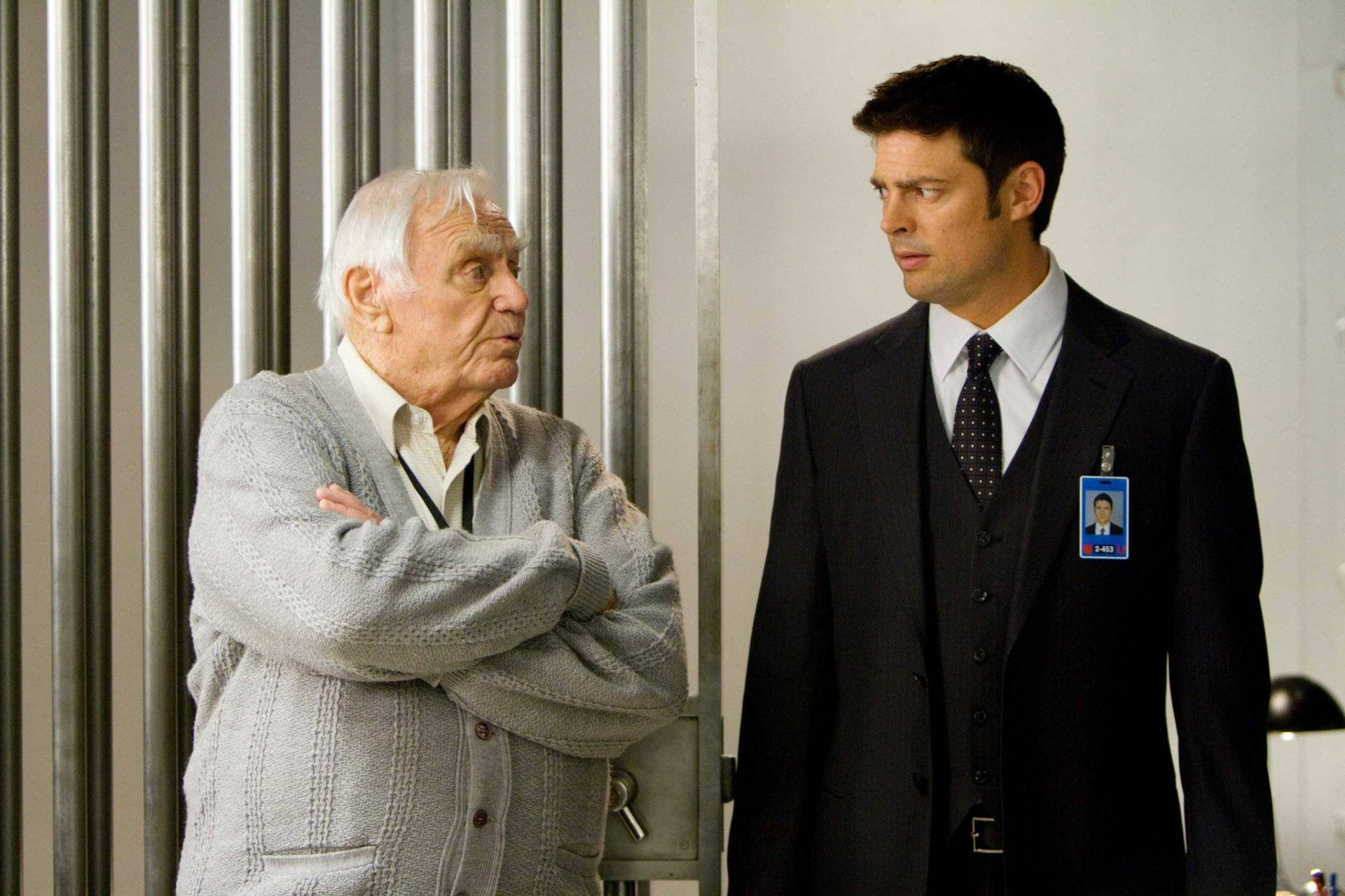 Ernest Borgnine And Karl Urban In Red Wallpaper