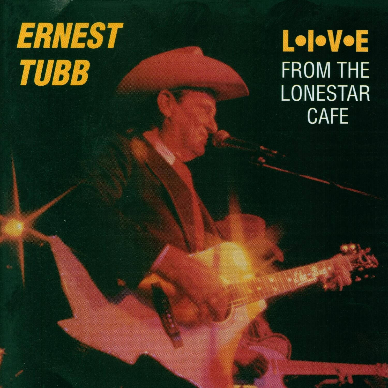 Caption: Legendary Country Music Star Ernest Tubb holding Waltz Across Texas Album. Wallpaper