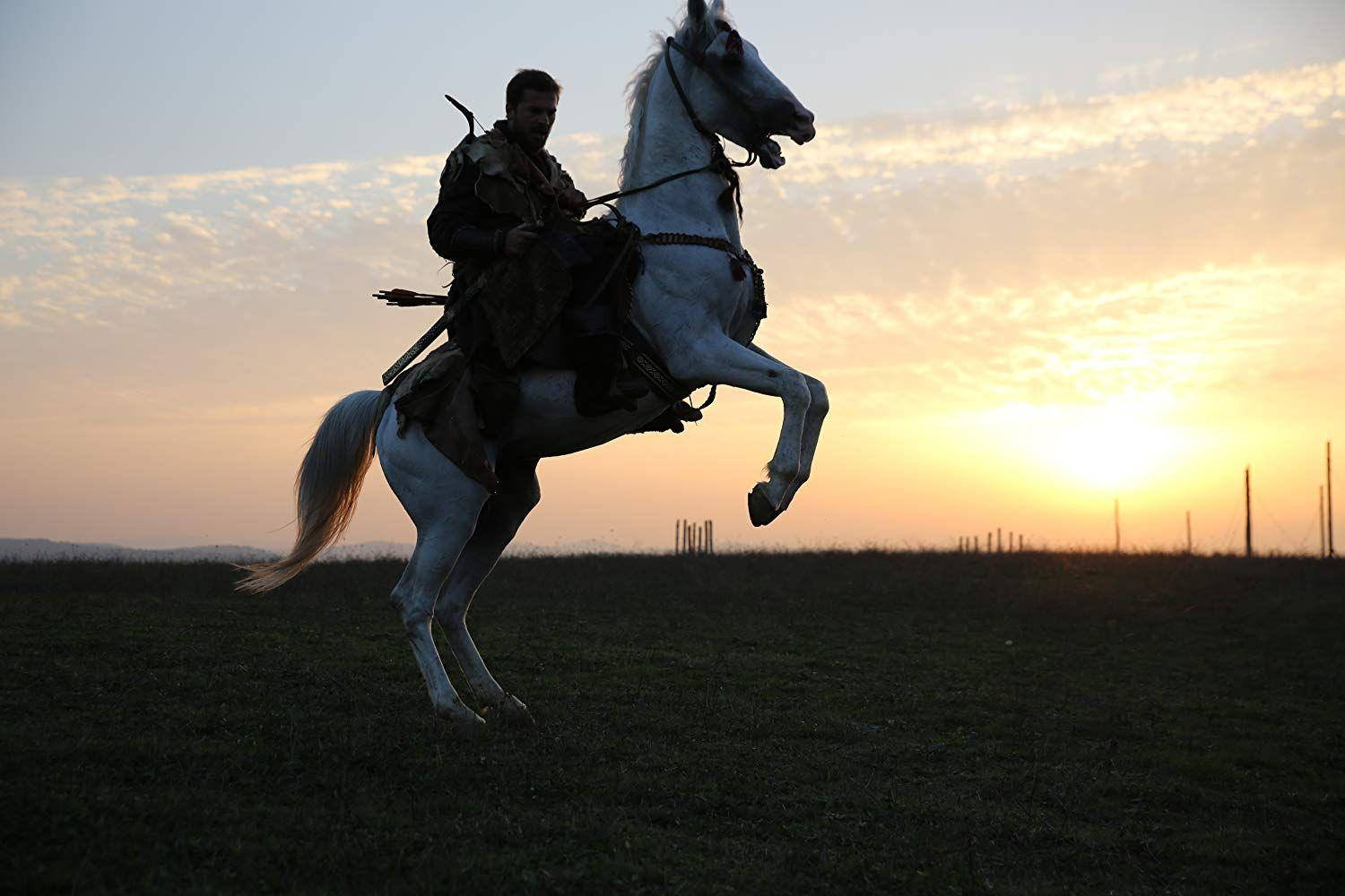 Ertugrul Gazi Riding His White Horse Wallpaper
