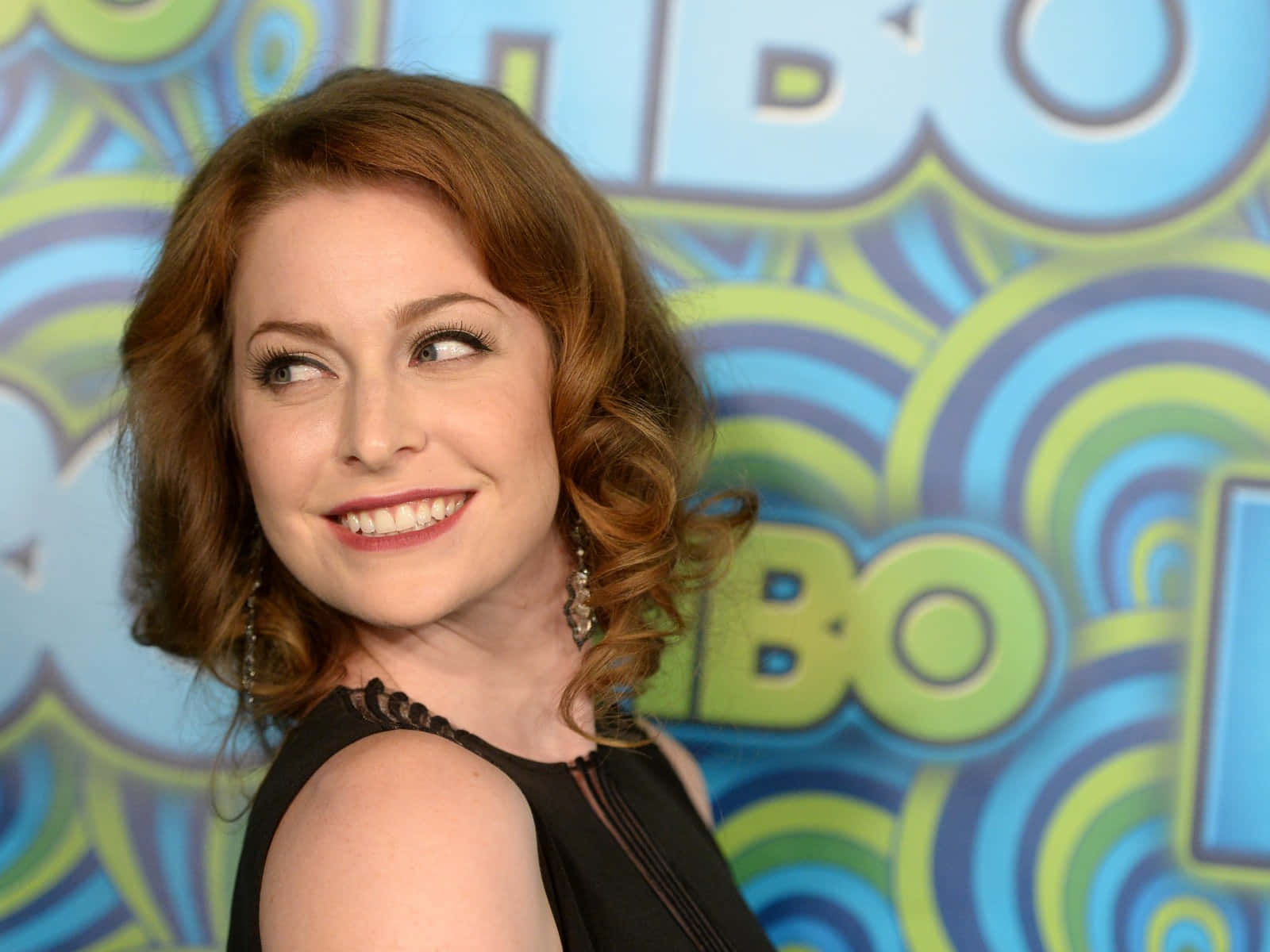 Esmé Bianco confidently posing in a stunning photoshoot Wallpaper