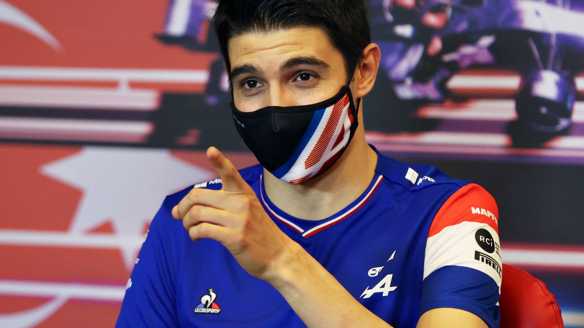 (assuming This Sentence Is Referring To A Wallpaper Featuring Esteban Ocon Wearing A Mask) Wallpaper