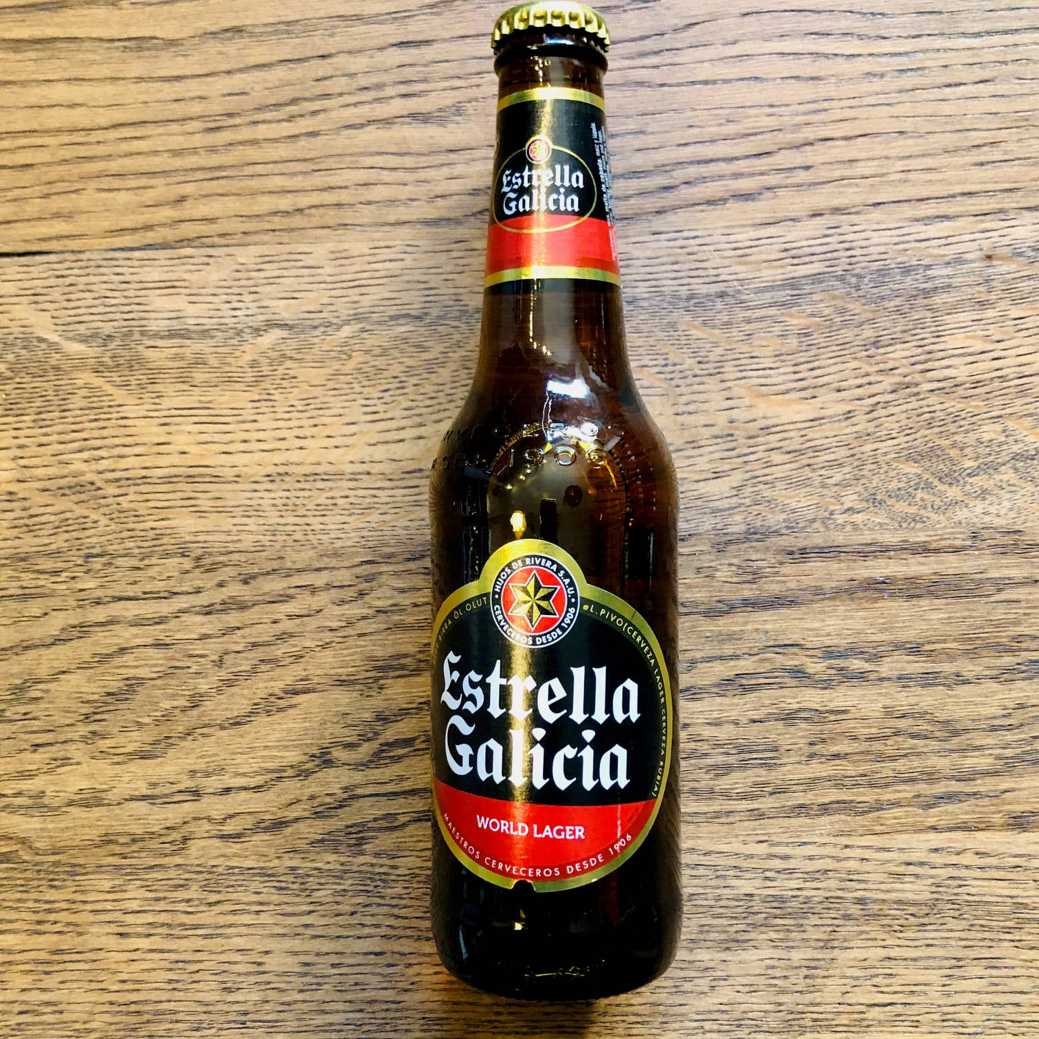 Estrella Galicia In A Dark Brown Bottle Wallpaper