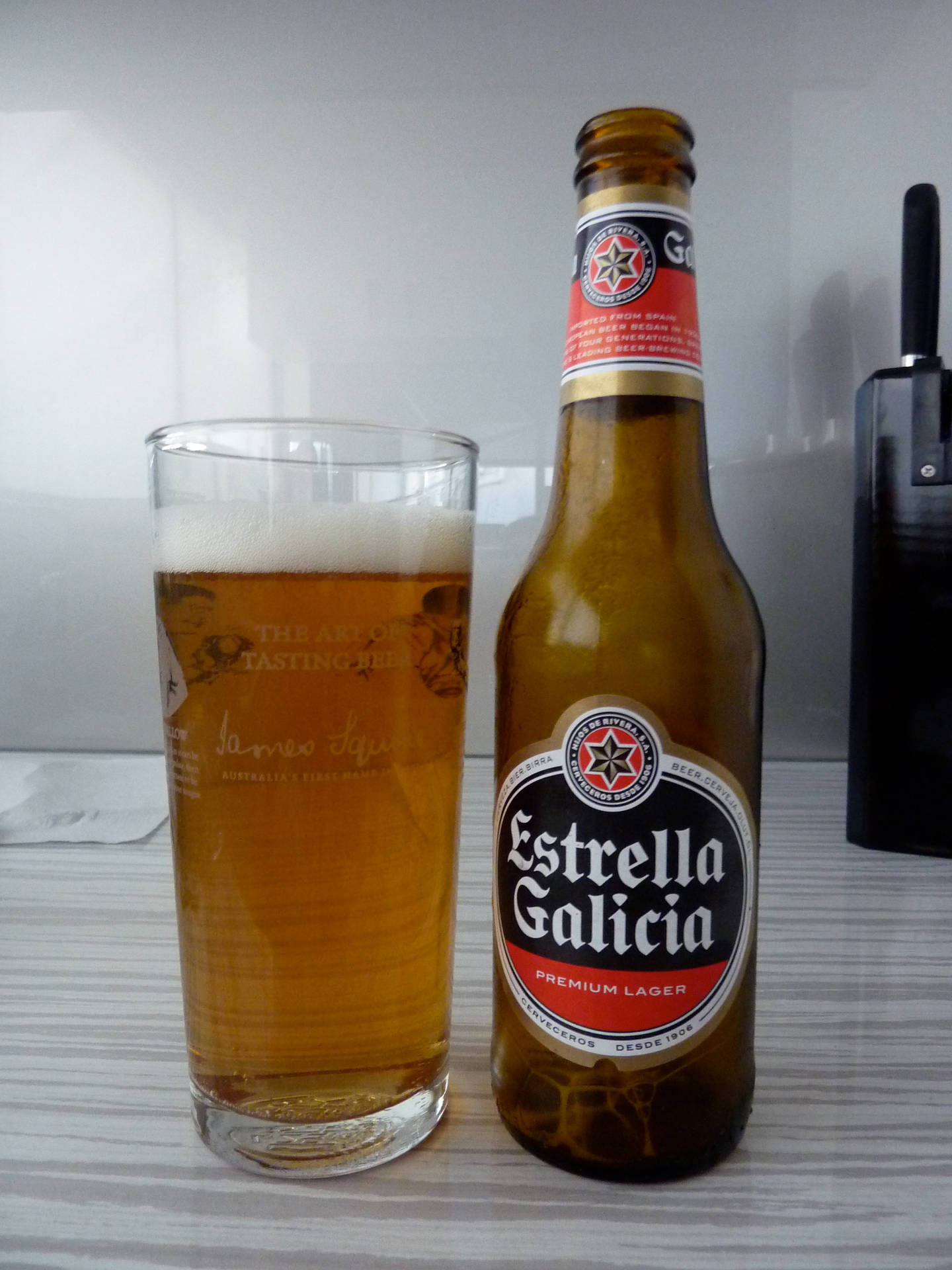 Estrella Lager With A Glass Of Beer Wallpaper