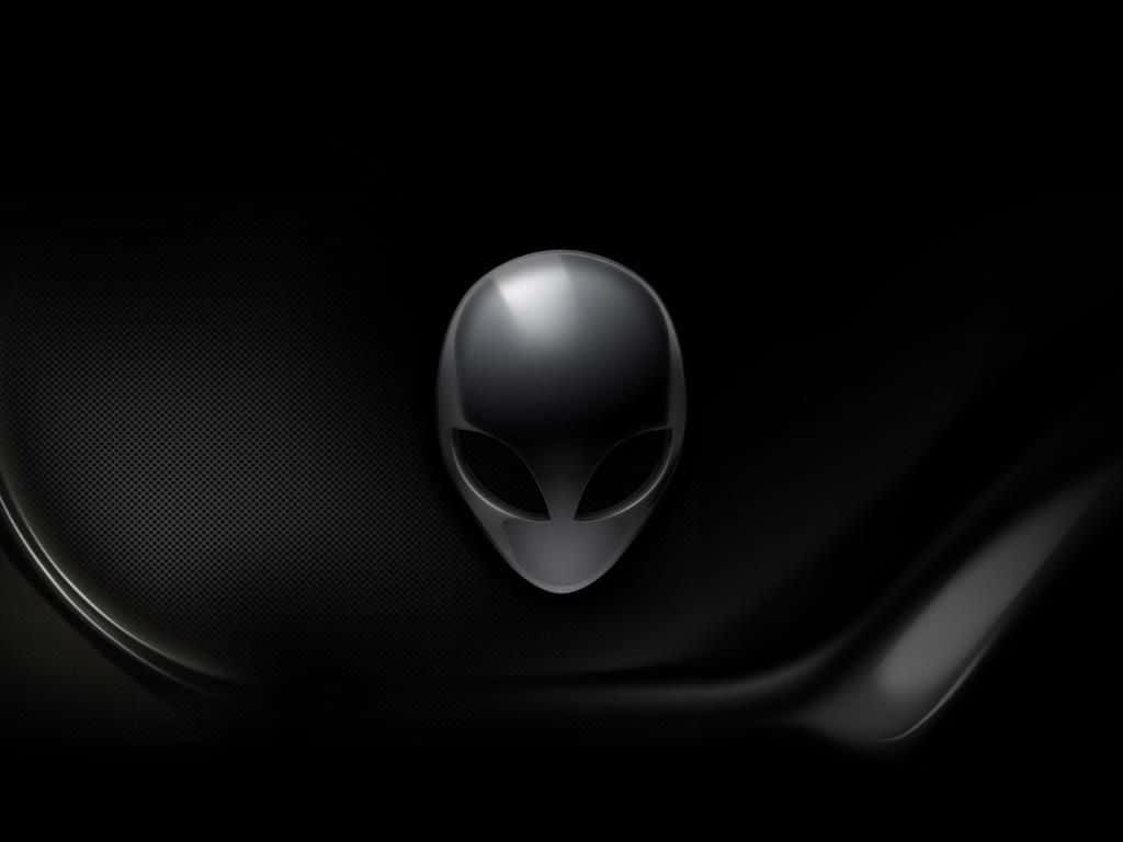 Aufeinem Schwarzen Hintergrund Wird Ein Schwarzer Alien-kopf Gezeigt.