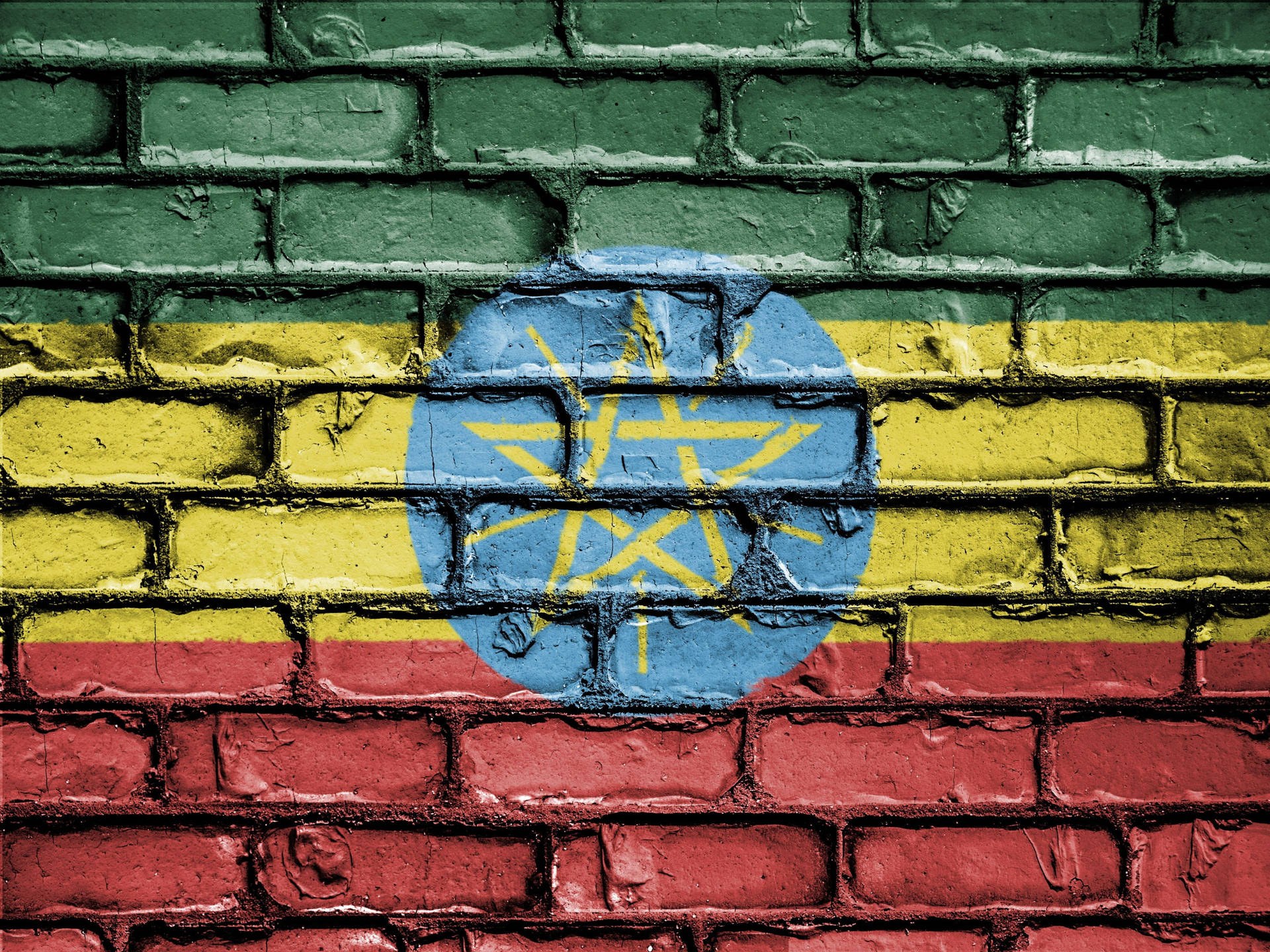 Banderade Etiopía En Una Pared De Ladrillos. Fondo de pantalla