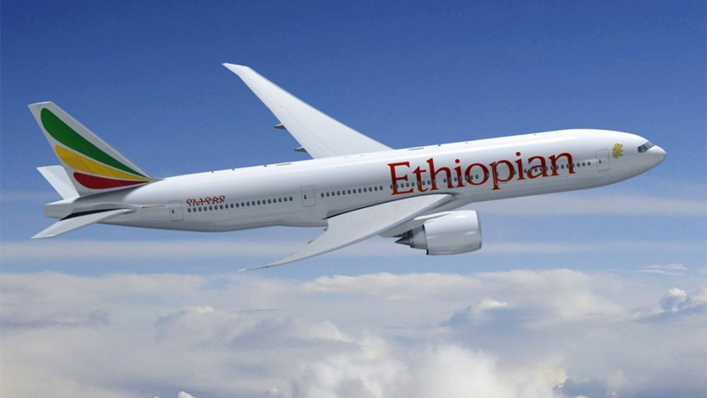 Ethiopian Airlines Gliding On Top Of Clouds Wallpaper