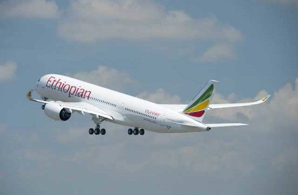 Ethiopian Airlines Plane Flying In The Sky Wallpaper
