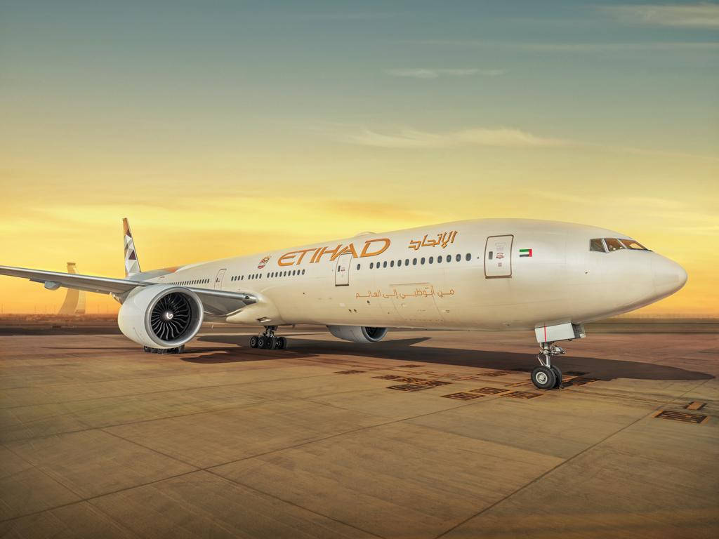 Etihad Airways Airplane At The Airport Wallpaper