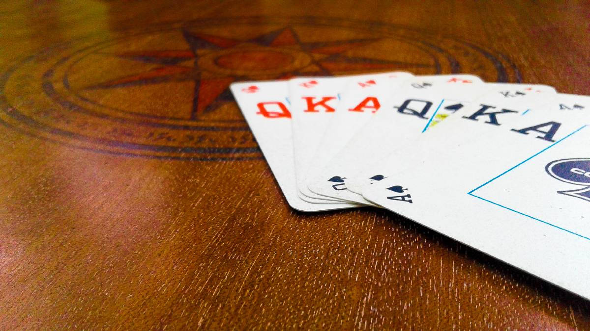 Euchre King Queen And Ace Cards Wallpaper