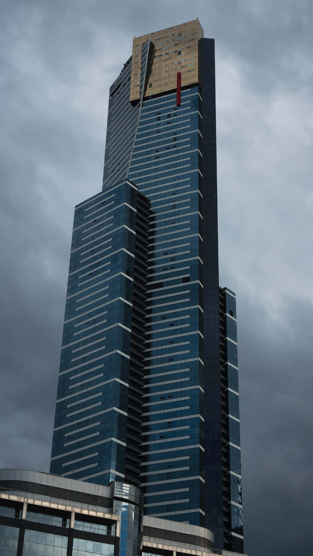 Eureka Tower Against Cloudy Sky Wallpaper