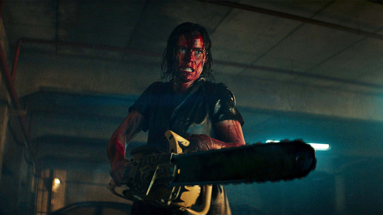 Evil Dead Rise Bloody Chainsaw Confrontation Wallpaper