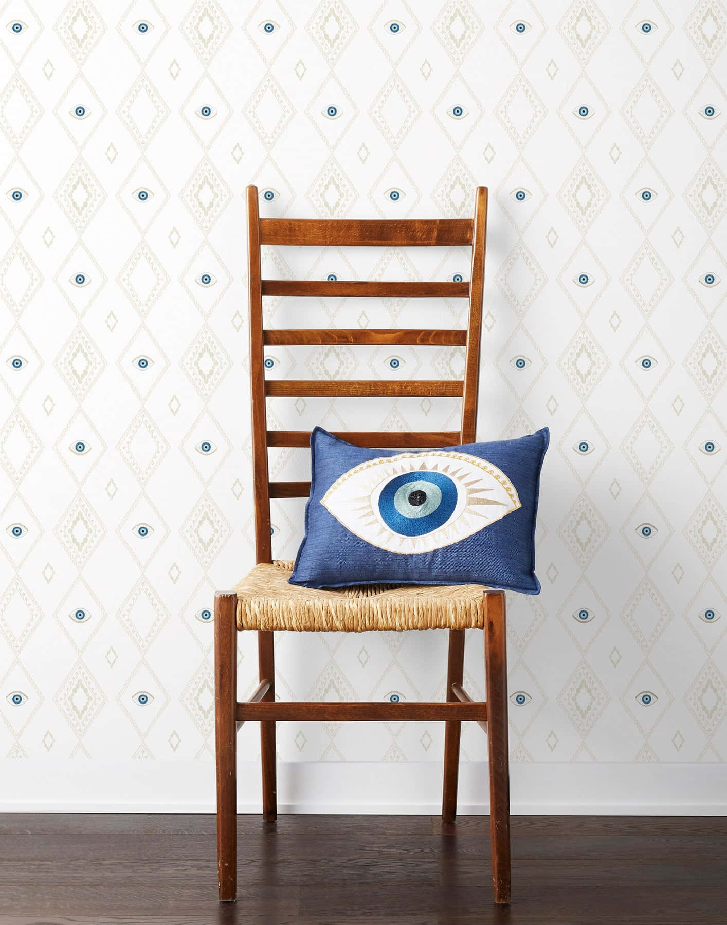 Evil Eye Pillowon Chair Wallpaper