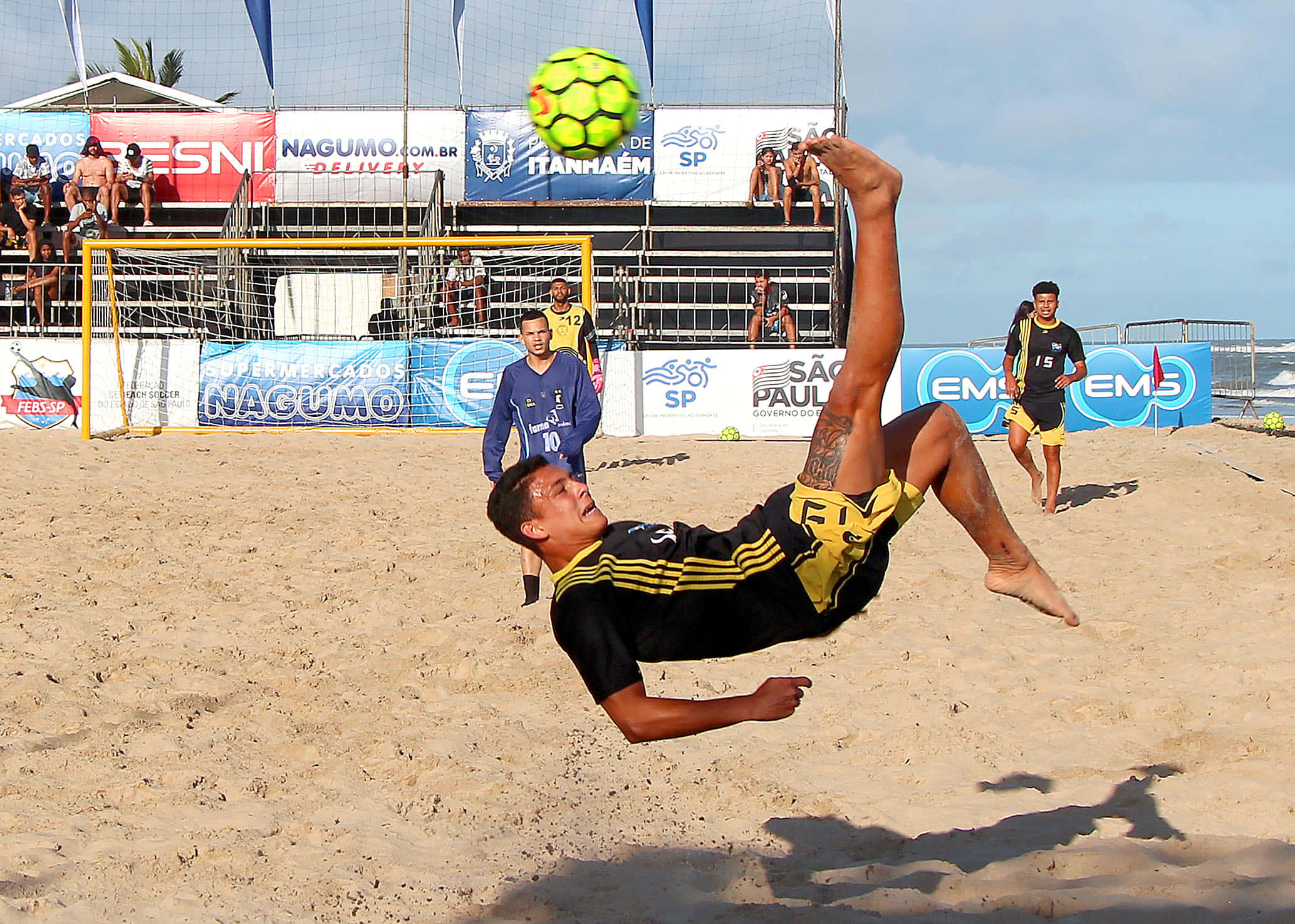 Download Exceptional Kick In A Beach Soccer Game Wallpaper | Wallpapers.com