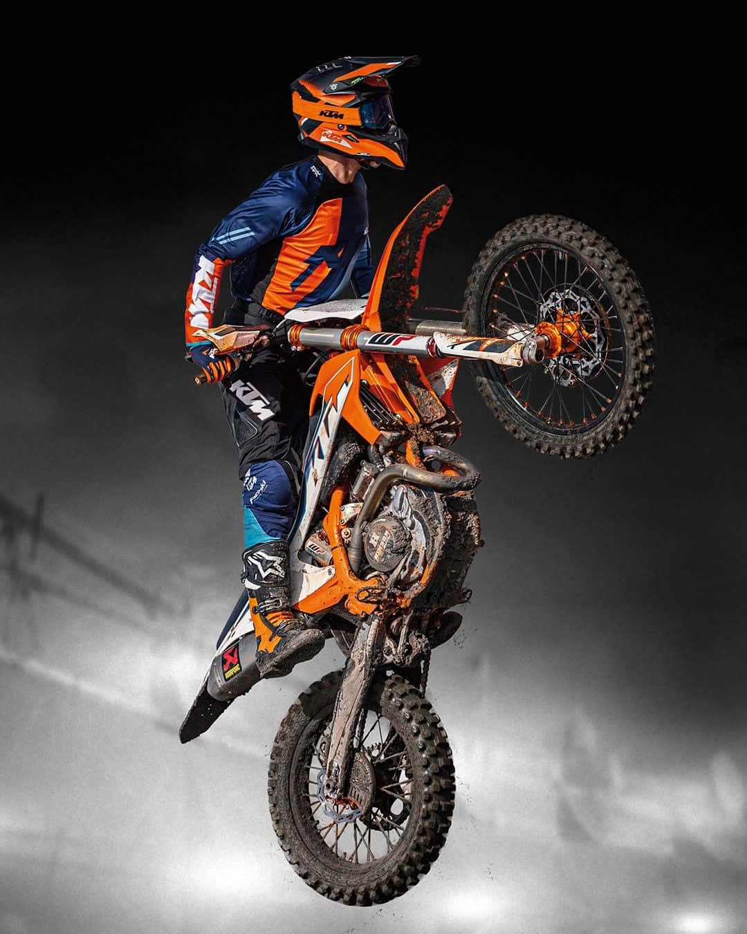 Exciting Ride: Ktm Sports Motorcycle In Action Wallpaper