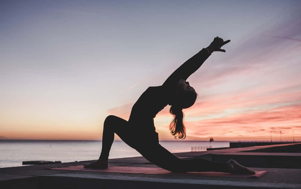 Immaginedi Una Donna In Posizione Di Yoga