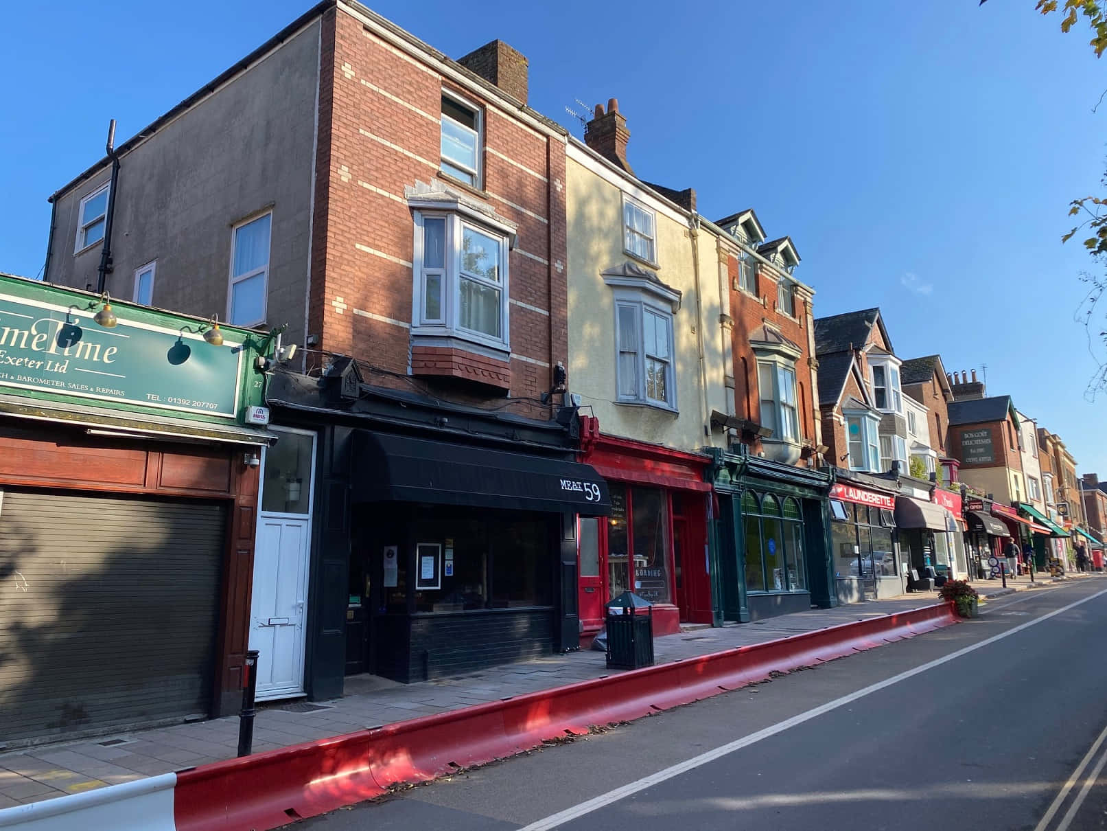 Exeter Street Viewwith Shops Wallpaper