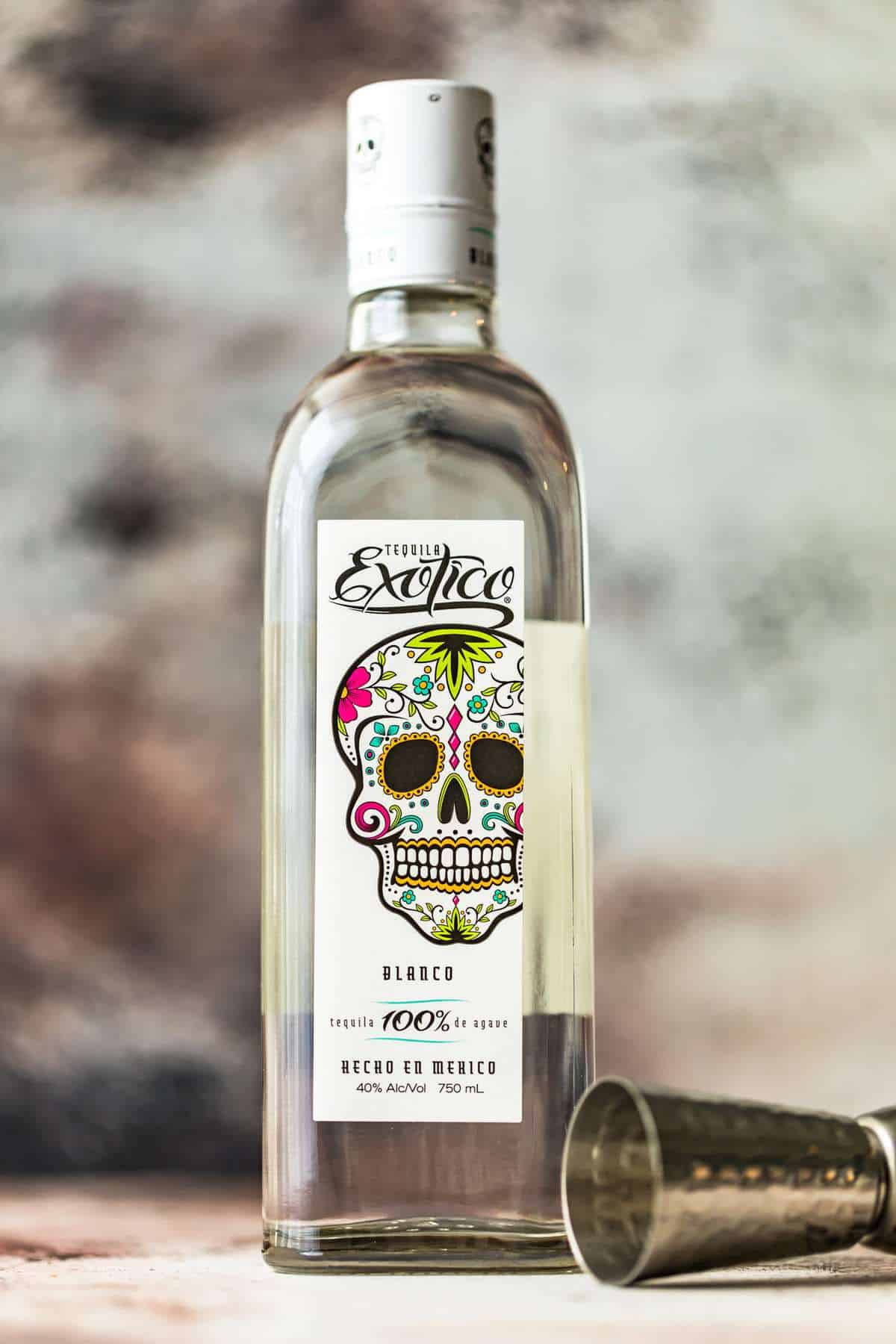 Exotico Tequila Blanco With Jigger Glass Wallpaper