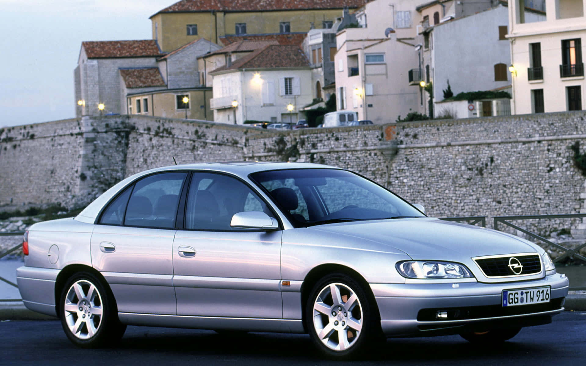 Expansive View Of A Dynamic Opel Omega In Motion Wallpaper