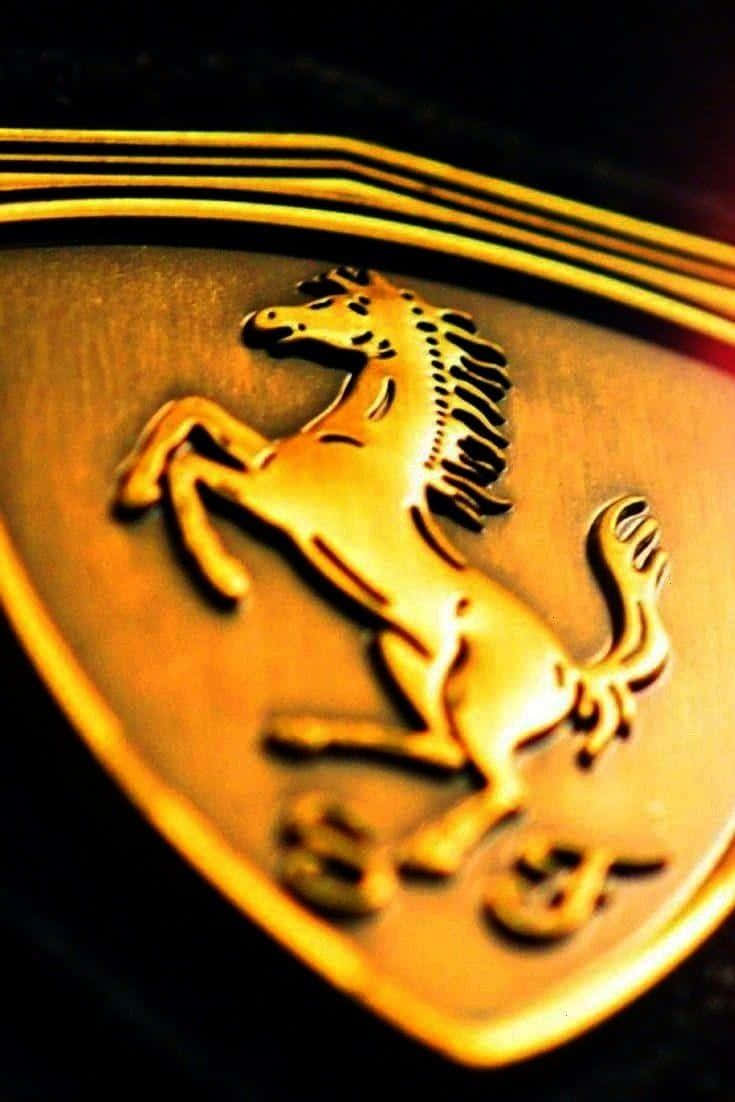 Logotipodorado Del Costoso Ferrari. Fondo de pantalla