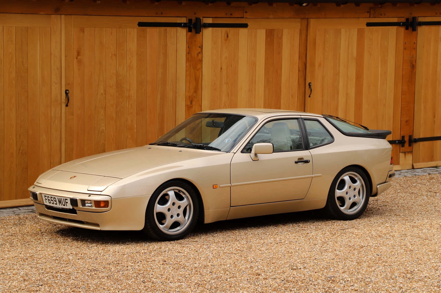 Exquisite 1980s Porsche 944 Showcasing Its Classic Beauty Wallpaper