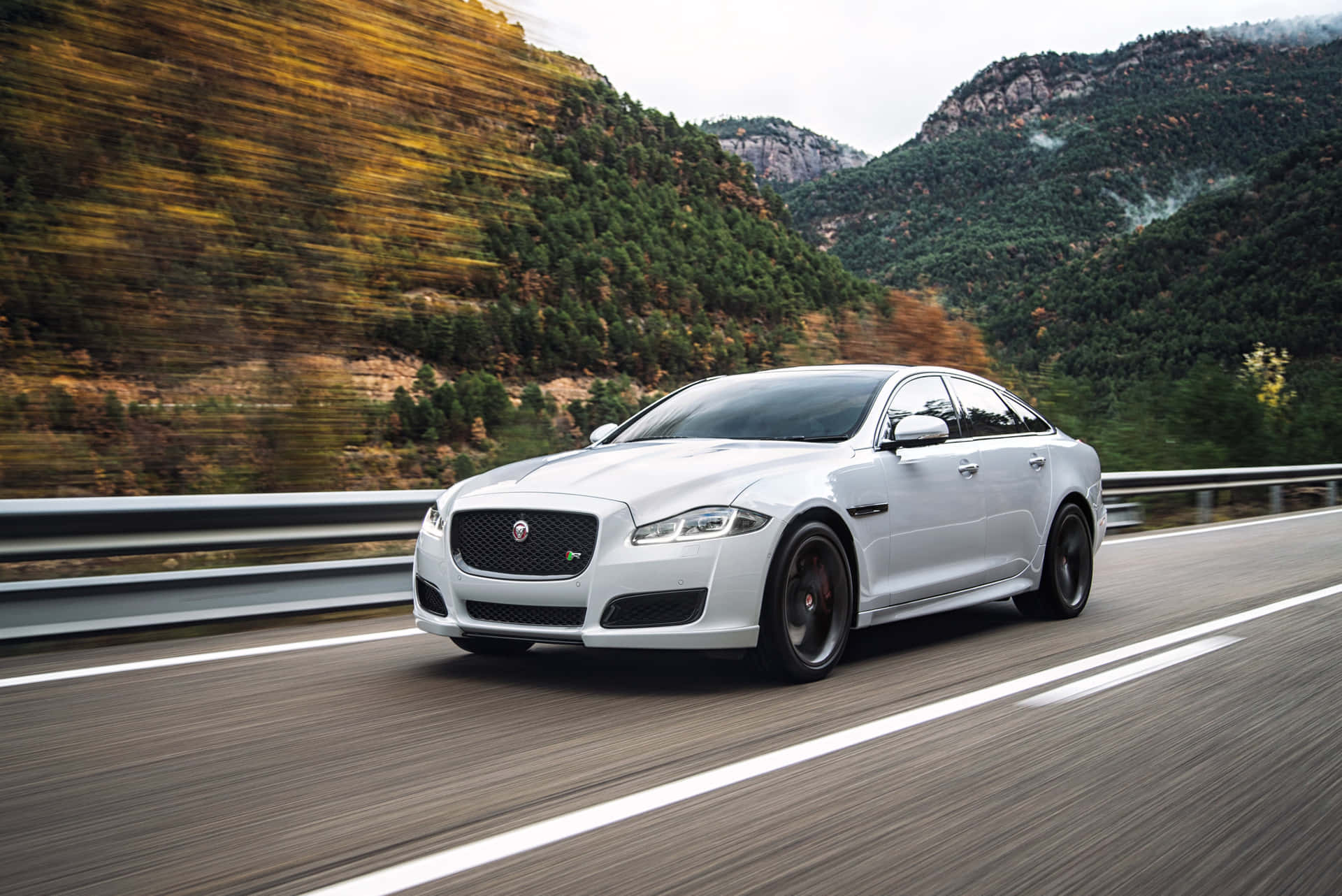 Exquisite And Powerful Jaguar Xj In Action Wallpaper