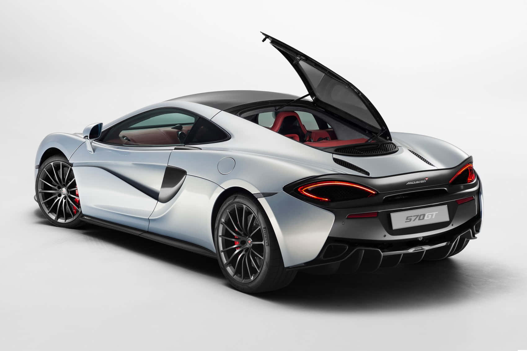 Eksklusiv Mclaren 570s I Perfekt Solnedgang Bakgrunnsbildet