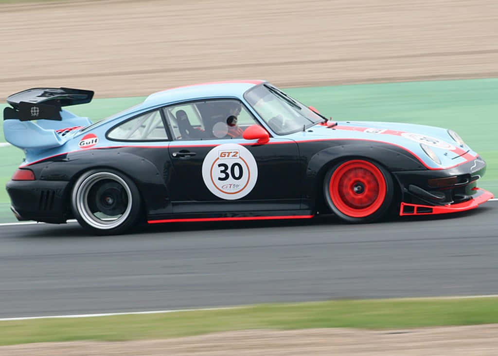 Exquisite Porsche 993 Roaring Down The Highway Wallpaper