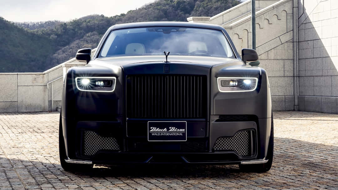 Extravagance On Wheels: The Captivating Rolls Royce Phantom Wallpaper