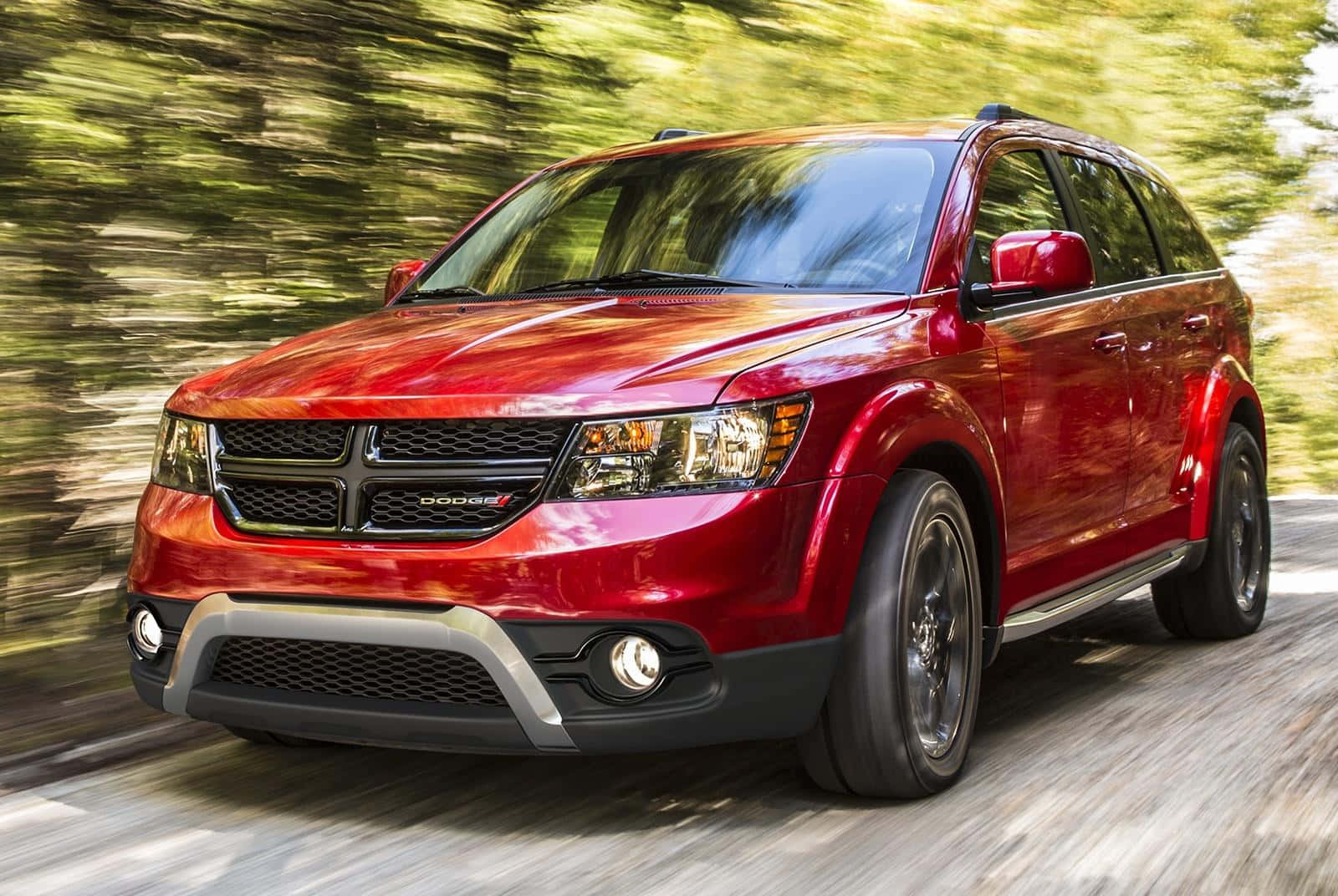 Eye-catching Dodge Journey Rolling Along A Tranquil Countryside Road Wallpaper