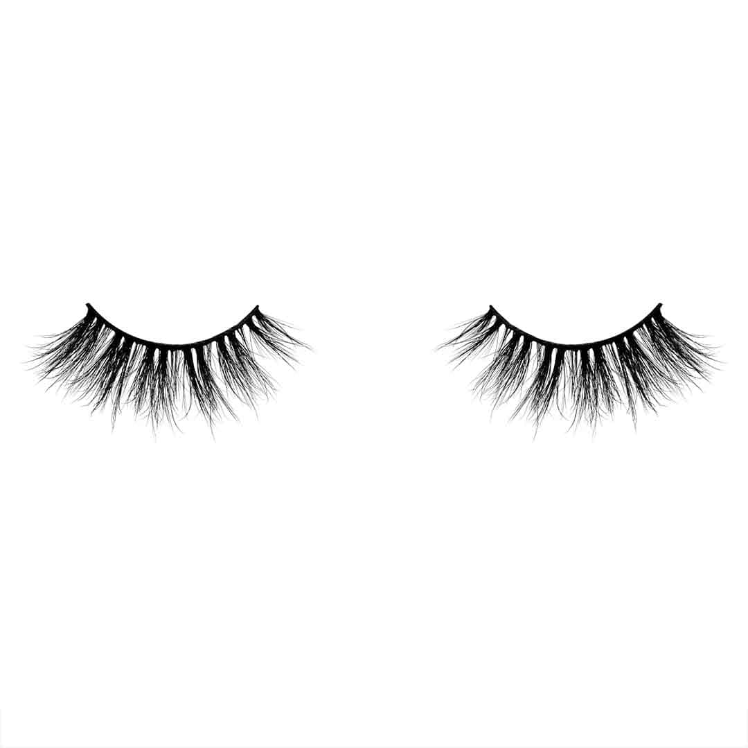 Two Pairs Of False Eyelashes On A White Background