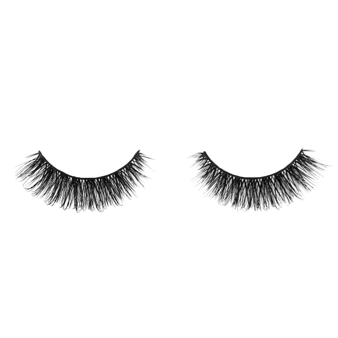 Two Pairs Of False Lashes On A White Background