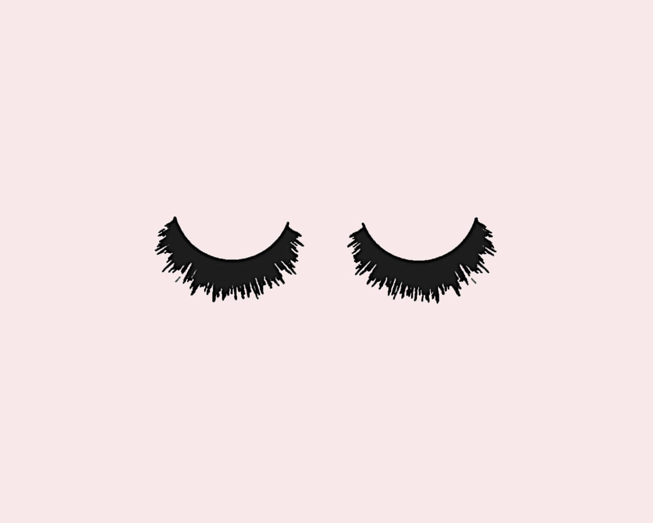 A Pair Of Black Lashes On A Pink Background
