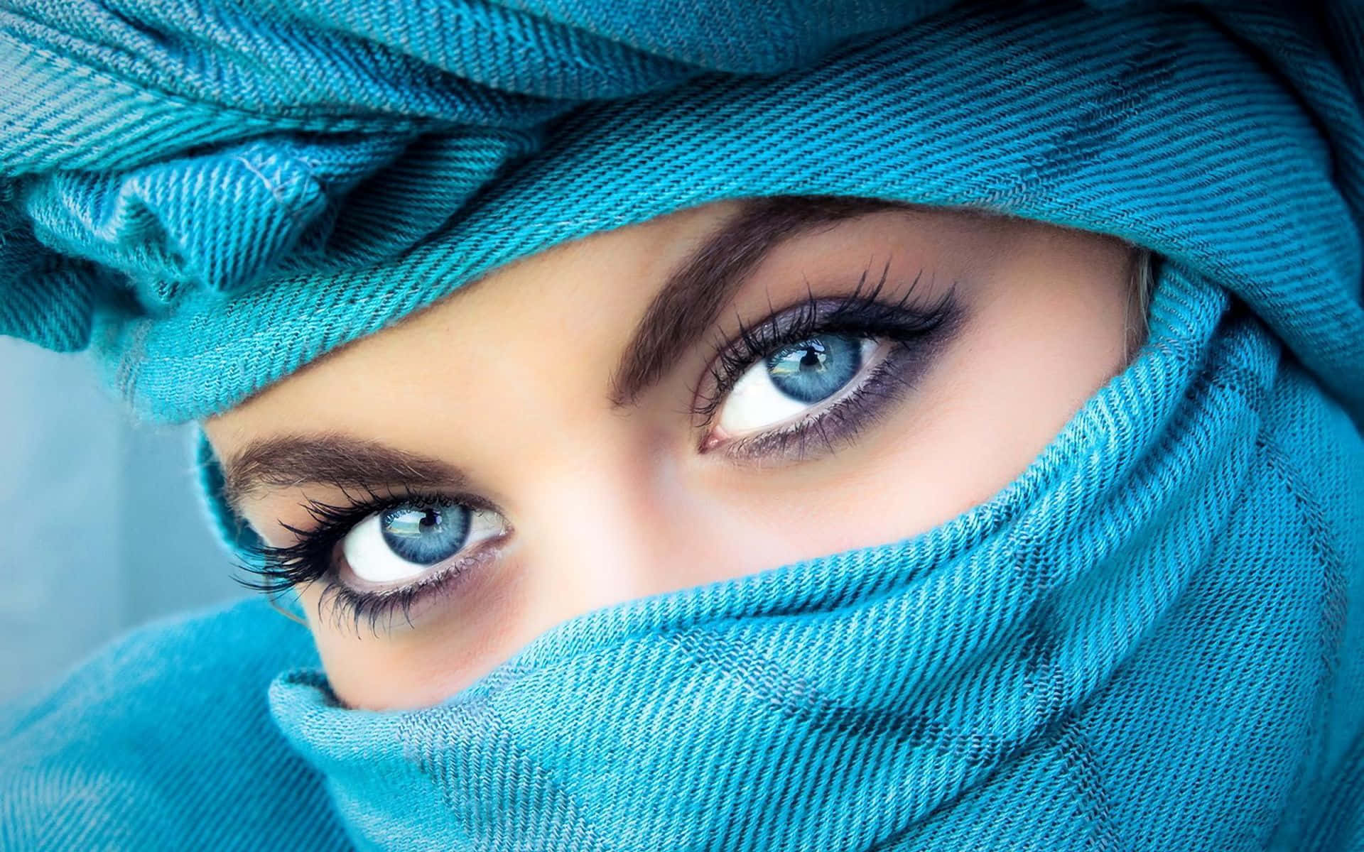 Close-up of a woman's green eye