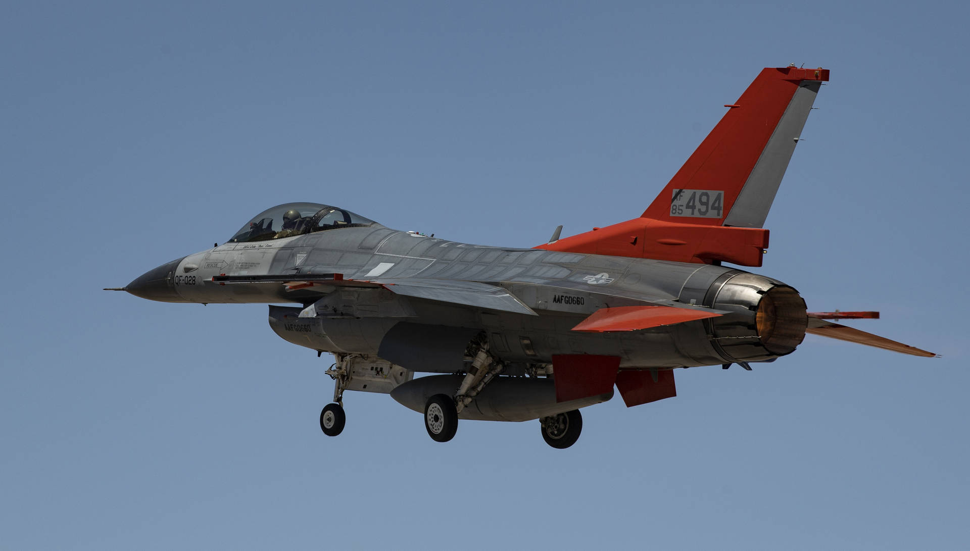 F-16 Fighter Jet In Red Wallpaper