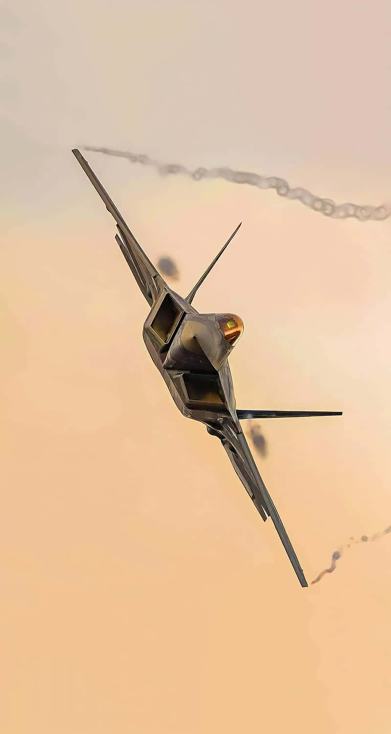 Et tæt-på skud af en F-22 Raptor Jet i luften Wallpaper