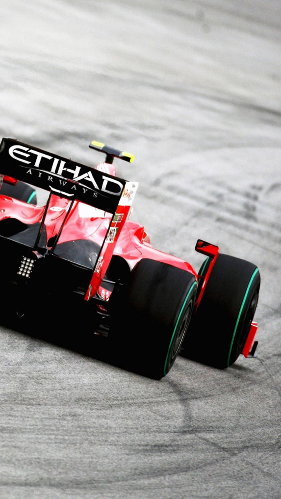Iltelefono F1 Abbraccia La Velocità Alla Gara Di Formula Red Dell'etihad. Sfondo